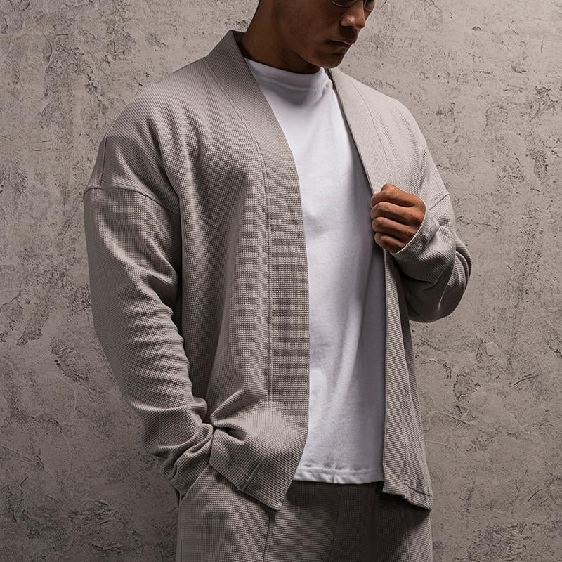 Signaturstrikket cardigan af Roberto Russo