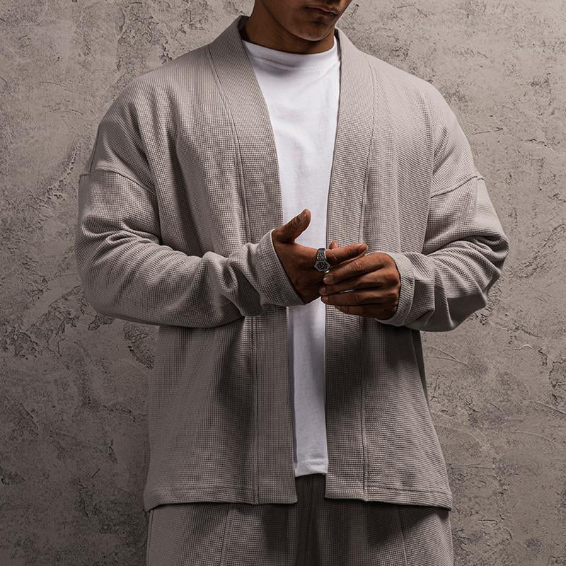 Signaturstrikket cardigan af Roberto Russo