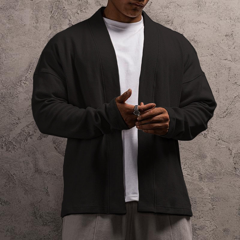 Signaturstrikket cardigan af Roberto Russo