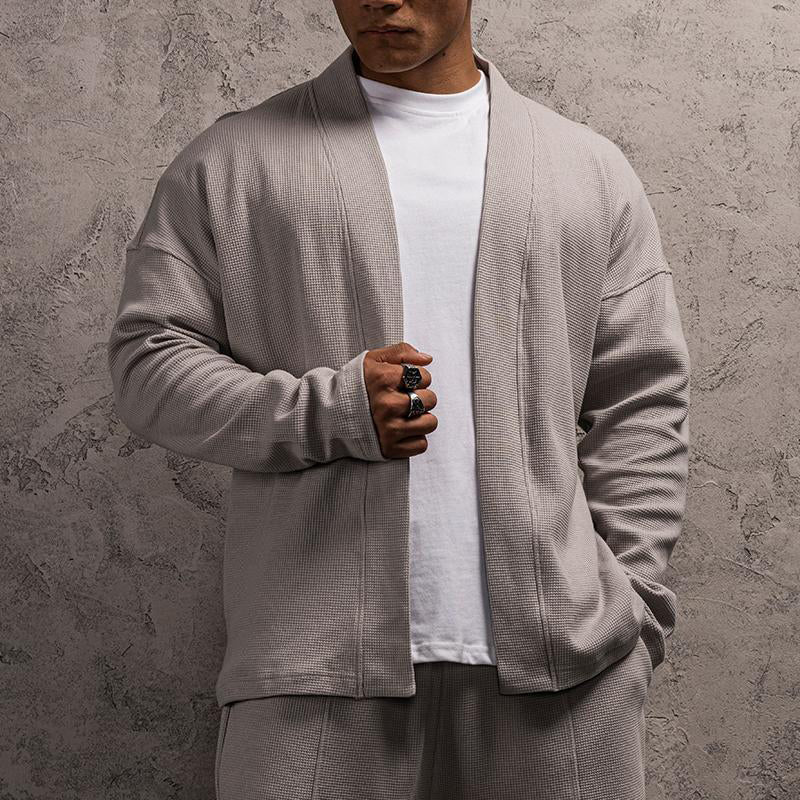 Signaturstrikket cardigan af Roberto Russo