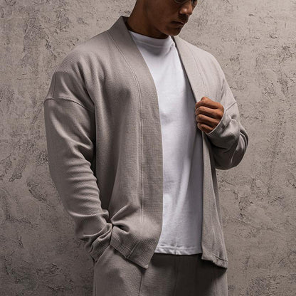 Signaturstrikket cardigan af Roberto Russo